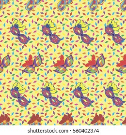 Seamless pattern with hand drawn carnaval masks on light yellow background with colorful papers. Pattern for Mardi Gras, carnaval or masquerade.