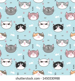 Seamless Pattern of Hand Drawn Cartoon Cat Face Design on Blue Background