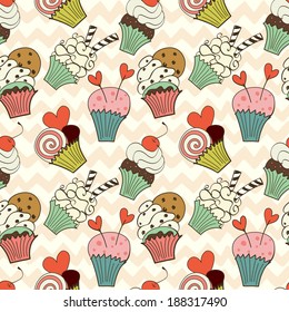 Seamless pattern with hand drawn cartoon cupcakes on chevron background. Cute doodle tasty muffins in bright colors.