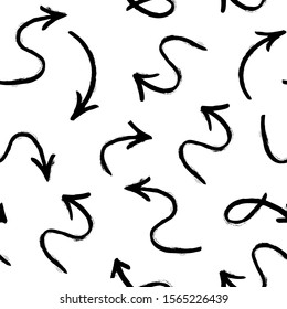 Seamless pattern with hand drawn charcoal textured black arrows on a white background. Print for fabric, wrapping papers, wallpapers, covers. Vector illustration. 