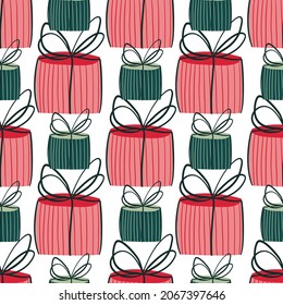 Seamless pattern with hand - drawn Christmas gifts and falling snow