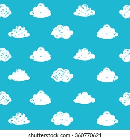 Seamless pattern with hand drawn clouds