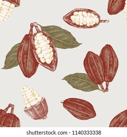 Patrón sin foco con granos de cacao y ramas dibujados a mano. Ilustración vectorial altamente detallada en estilo vintage