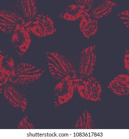 Seamless pattern with hand drawn colorful butterflies on dark background. Monotype effect