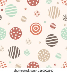 Seamless pattern with hand drawn colorful polka dots on texture background.