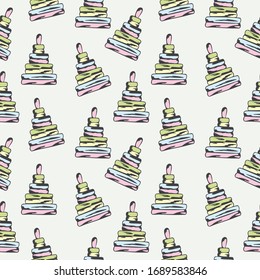 Seamless pattern with hand drawn colorful children's pyramid on a beige background. It can be used for decoration of textile, paper and other surfaces.