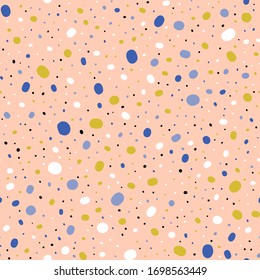 Seamless pattern with hand drawn colorful circles and dots on a pink background. Vector illustration.