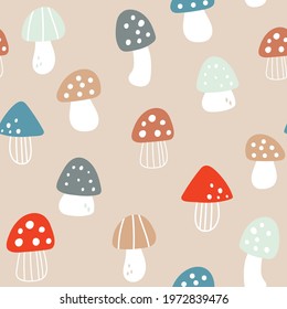 Seamless pattern with hand drawn colourful mushrooms. Creative childish pattern. Vector illustration