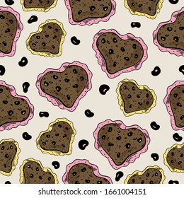 Seamless pattern with hand drawn cookies in the shape of a heart on a beige background. Doodle, simple outline illustration. It can be used for decoration of textile, paper and other surfaces.