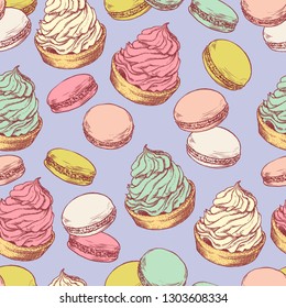 Seamless pattern with hand drawn creamy biscuit and french macaroons. Hand drawn vector illustration in vintage engraving style on blue background. Sweet colorful dessert.