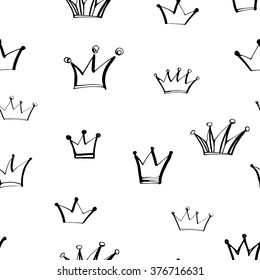 Seamless pattern with hand drawn crowns. Ink illustration. Seamless ornament for wrapping paper. Repeat design elements. Vector art.