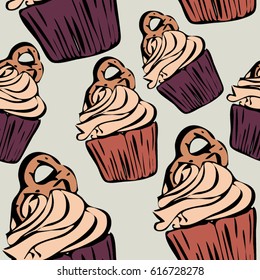Seamless pattern with hand drawn cupcakes