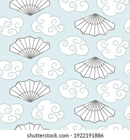 Seamless pattern with hand drawn curly clouds and fan. Cloudy background in light blue. Vector illustration in Chinese or Japanese style. Fantasy Oriental elements.