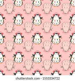 Seamless pattern with hand drawn cute penguins holding on festive Christmas Light Bulb on pink background. Cute illustration. Season greeting. Winter Xmas holidays. 