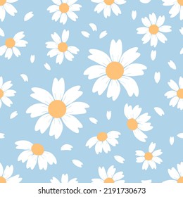 Seamless pattern with hand drawn daisy flower and flying petals on blue background vector illustration. Cute floral print.