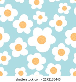 Seamless pattern hand drawn daisy flower on blue background vector illustration. Cute floral print.