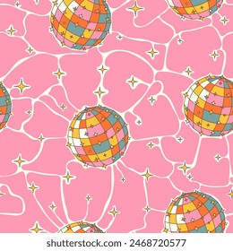 Seamless pattern hand drawn disco ball and stars on a pink background.