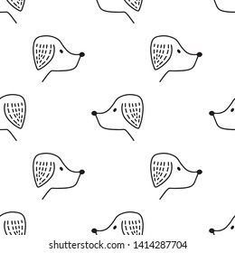 Seamless pattern with hand drawn dog face. Childish texture for fabric, textile, vector fill. Vector background 
