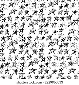 Seamless pattern with hand drawn doodle stars