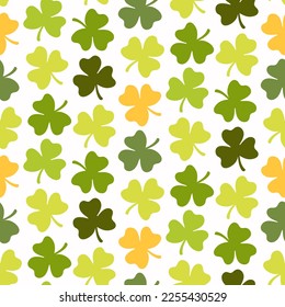 Seamless pattern of hand drawn, doodle Irish clover leaves, on isolated background. Design for St. Paddy day celebration, party decoration, scrapbooking, home décor, textile, print.