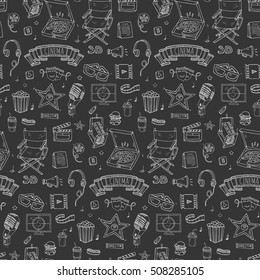Seamless pattern Hand drawn doodle Cinema set. Vector illustration. Movie making icons. Film symbols collection. Cinematography freehand: camera, film tape, photo camera, pizza, popcorn, projector.