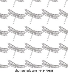Seamless pattern with hand drawn dragonflies. Vector illustration