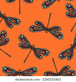 Seamless pattern with hand drawn   dragonfly in zentangle style on orange background.