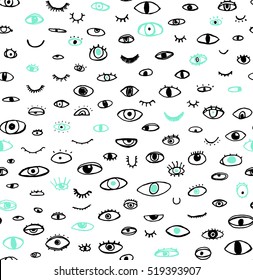 Seamless pattern of hand drawn eyes on white background, bohemian trendy style