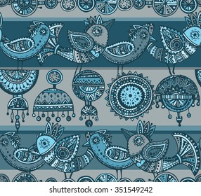 Seamless pattern with hand drawn fancy birds in ethnic ornate doodle style with jewelry elements. Colorful vector background