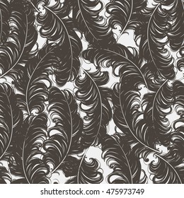 Seamless pattern with hand drawn feathers. Vector illustration.
