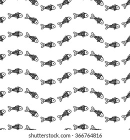 Seamless pattern with hand drawn fish.Vector illustration.