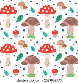 Seamless pattern with hand drawn flat mushrooms, fly agarics, foliage and polka dots on a white background. Vector texture with forest fungus. Baby wallpaper for nursery