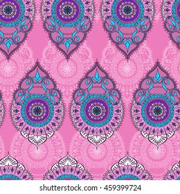 Seamless pattern with hand drawn floral ornament and mandala elements. Vector illustration.