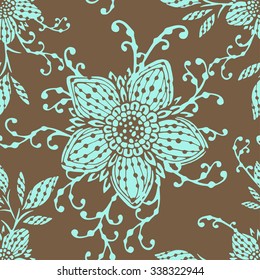 Seamless pattern with hand drawn flowers and floral elements. In light brown and light blue colors.
