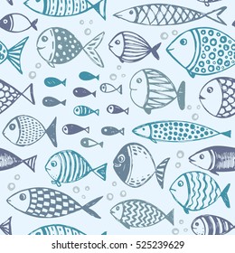 Seamless pattern with hand drawn funny fishes in sketch style. Vector decorative endless marine background. Fabric design