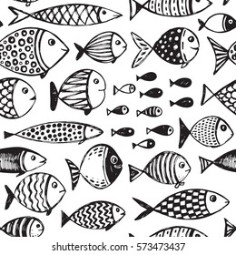 Seamless pattern with hand drawn funny fishes in sketch style. Vector decorative endless marine background. Fabric design.