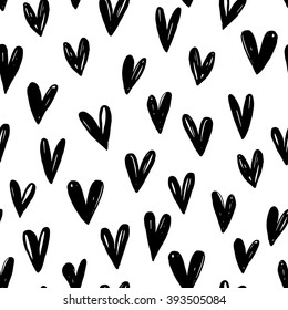 Seamless pattern with hand drawn graphic hearts. Ink illustration. Hand drawn ornament for wrapping paper. Decorative pattern for banners, flayers, cards and posters, for invitation on weddings.