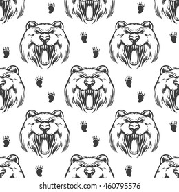 Seamless pattern with hand drawn grizzly bear head and bear footprints. Vector illustration