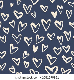 Seamless pattern with hand drawn heart. Hearts painted dry brush. Ink illustration. Ornament for wrapping paper.
