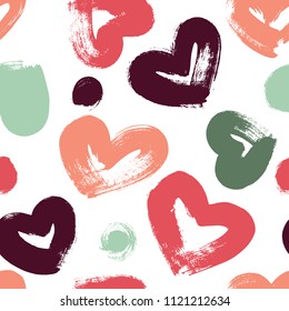 Seamless pattern with hand drawn heart. Hearts painted dry brush. Ink illustration. Ornament for wrapping paper.
