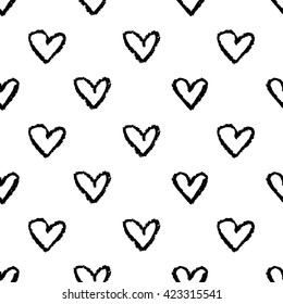 Seamless pattern with hand drawn heart shapes. Charcoal doodles background