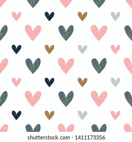 Seamless pattern with hand drawn  hearts. Childish texture for fabric, textile, apparel. Vector background 