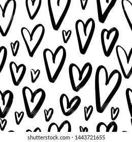 Seamless pattern of hand drawn hearts on a white background. Vector illustration. 