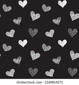 Seamless pattern with hand drawn hearts in doodle style. Black and white colors. Valentines day love and wedding texture background. Beautiful print for textile, cards, gift wrap, design and decor. 