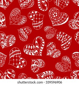 Seamless pattern with hand drawn hearts in zentangle style. Pattern for coloring book. Coloring page for adult anti stress. Made by trace from sketch. Valentine's day background.