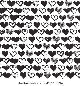 Seamless pattern with hand drawn hearts background. Monochrome brush ink illustration with hearts. 