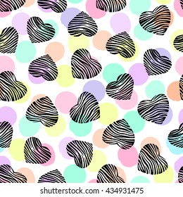 Seamless pattern with hand drawn hearts on a polka dot background.