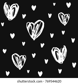 Seamless pattern with hand drawn hearts on dark bakground for fabric print, paper card, textile, fashion. Valentine's day, Wedding, Birthday, Love background. Vector brushstroke grunge hearts.