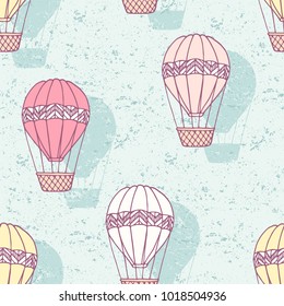 Seamless pattern with hand drawn hot air balloons. Grunge background. Vector illustration