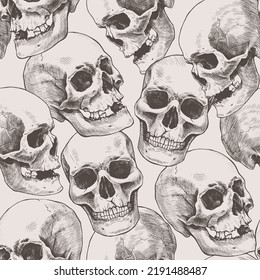 Seamless pattern of hand drawn human skulls. Vector graphic beige illustration.